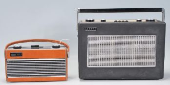 Two vintage 20th Century portable radios. One being a Roberts Rambler having a leather and wood
