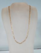 A stamped 9ct gold figaro necklace chain having a spring ring clasp. Weight 6.3g. Measures 24