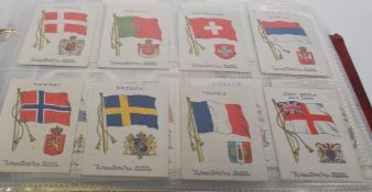 An album of vintage TyPhoo tea trade cards in full sets. The complete sets include 