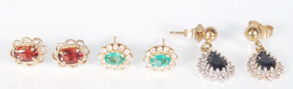 A group of three pairs of 9ct gold earrings to include a pair of green stone set earrings with a