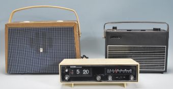 A good vintage retro 20th Century portable radio by Ferranti having tuning knobs atop the glass