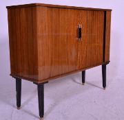 A vintage retro 20th Century tambour roll sideboard credenza of good small proportions raised on