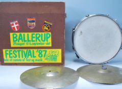 A good chrome Premier made 14 inch Snare Drum having a dark silver metallic coloured body.