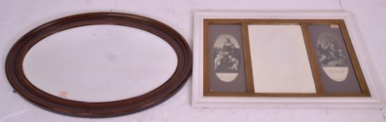 A vintage 20th Century white painted pine framed mirror of rectangular form having an inner giltwood