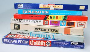 A good collection of vintage 20th century board games to include examples like '' Escape from