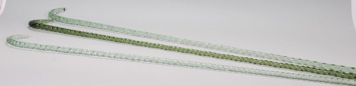 A group of three 19th Century Victorian Nailsea glass walking sticks. Each walking stick of