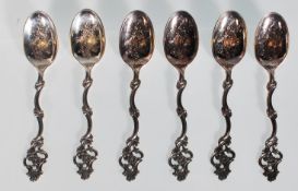 A group of six 20th Century stamped 830 silver tea spoons each having scrolled design handles with