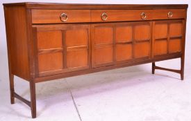 A 20th Century 1970's retro Nathan Long John teak wood sideboard credenza raised on shaped legs