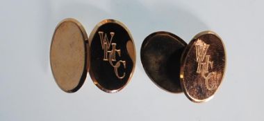 A pair of gents 9ct gold hallmarked cufflinks of oval disc form, engraved with the initials WHC,