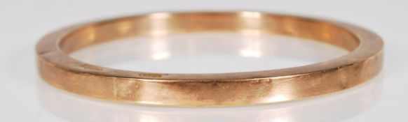A vintage 20th Century hallmarked 9ct gold bangle of chunky form, Birmingham assay date letter W and