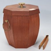 A vintage mid century teak wood retro ice bucket of octagonal form having a lined interior with knob