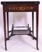 An Edwardian rosewood and marquetry envelope card table in the manner of Edwards & Roberts, the