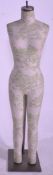 A vintage 20th Century point of sale shop advertising display mannequin of female form raised on a