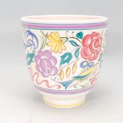 A vintage retro 20th Century Poole pottery LE pattern jardiniere having a cylindrical body raised on