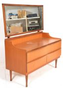 A vintage retro 20th Century teak wood dressing table chest having a large central mirror panel with