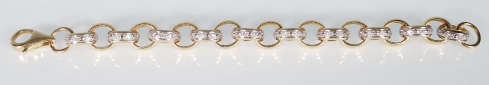 A English hallmarked good 9ct yellow gold chunky link bracelet with every other link having illusion