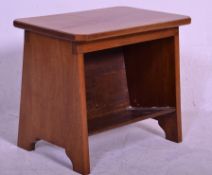 An early 20th Century Arts and Crafts oak magazine