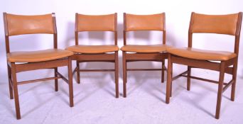A set of four retro 20th Century teak framed dinin