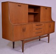 A retro 20th Century 1970's G-Plan teak highboard / sideboard credenza in the Fresco range. Raised