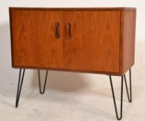 A Victor B. Wilkins G-Plan fresco range 1960's retro vintage twin door cupboard having shelved