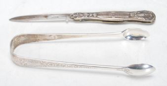 A good 19th Century William IV pocket knife having repousse floral body with a good silver blade