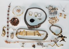 A selection of vintage and letter costume jewellery to include gold and silver tone jewellery, snake