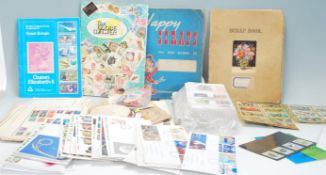 A collection of various first day cover stamps with some loose examples with many on envelopes,