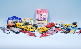 A collection of vintage diecast toy cars and vehic