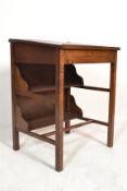 A 1920's oak school desk of good quality raised on
