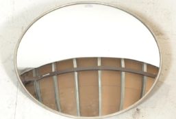 A vintage 20th Century convex security wall mirror