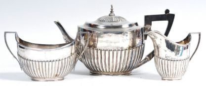 VICTORIAN HALLMARKED SILVER TEA SERVICE BY EDWARD HUTTON LONDON
