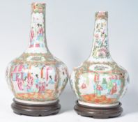 NEAR PAIR OF 19TH CENTURY CHINESE CANTON ENAMEL BOTTLE VASES