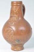 A RARE 17TH CENTURY GERMAN ANTIQUE BARTMANN BELLARMINE JUG