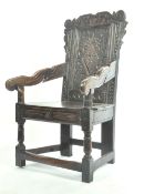 ANTIQUE CARVED OAK WAINSCOT CHAIR WITH SHAPED ARM RESTS