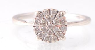 9CT WHITE GOLD AND DIAMOND CLUSTER RING 0.25PNTS