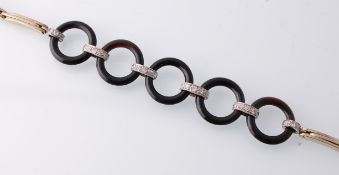 An Art Deco 18ct White Gold, Onyx & Diamond Extending Bracelet