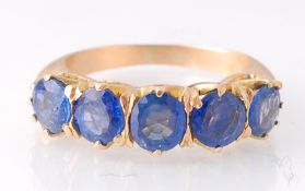 A Gold & Sapphire 5 Stone Ring