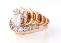 A French Art Deco 18ct Gold Platinum & Diamond Ring