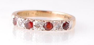 9CT GOLD DIAMOND AND GARNET 7 STONE RIN