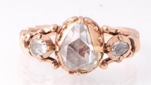 An 19th century Georgian gold and diamond ring. The ring being set with a central rose cut pear