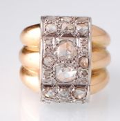An Art Deco Retro 18ct gold and Diamond Ring. The ring set with three rows of rose cut diamonds