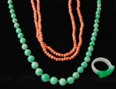 A Coral Bead Necklace a Jade Necklace & a Ring