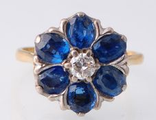 A Hallmarked 18ct Gold Sapphire & Diamond Cluster Ring