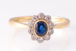 A Hallmarked 18ct Gold Sapphire & Diamond Cluster Ring