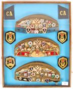 COLLECTION OF 20TH CENTURY RUSSIAN BADGES & CAPS