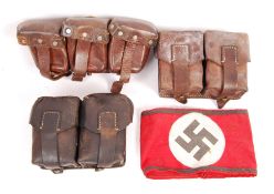 COLLECTION OF GERMAN AMMUNITION POUCHES & NAZI ARM