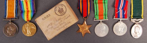 WWI & WWII FAMILY MEDAL GROUP - PRIVATE IN THE QUEEN'S REGIMENT