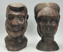 A pair of 20th Century African carved hardwood fig