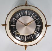 A vintage 20th Century electric bi colour wall clo