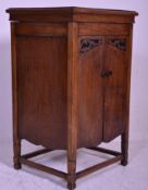 An early 20th Century oak cased Edwardian upright